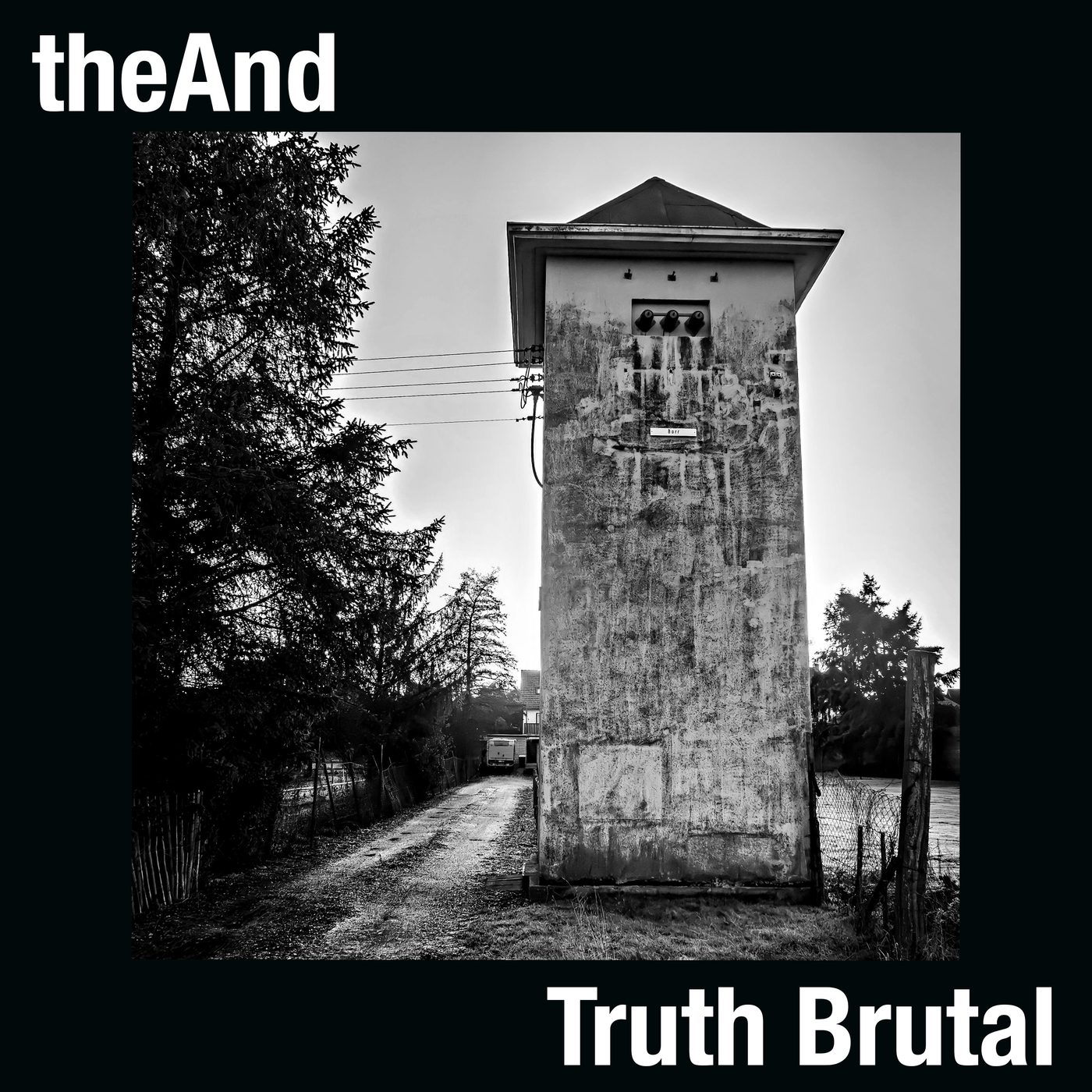 Truth Brutal cover artwork — a weathered concrete tower on a black background